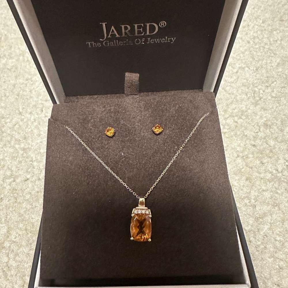 Topaz and diamond Necklace and topaz earrings from Jared.